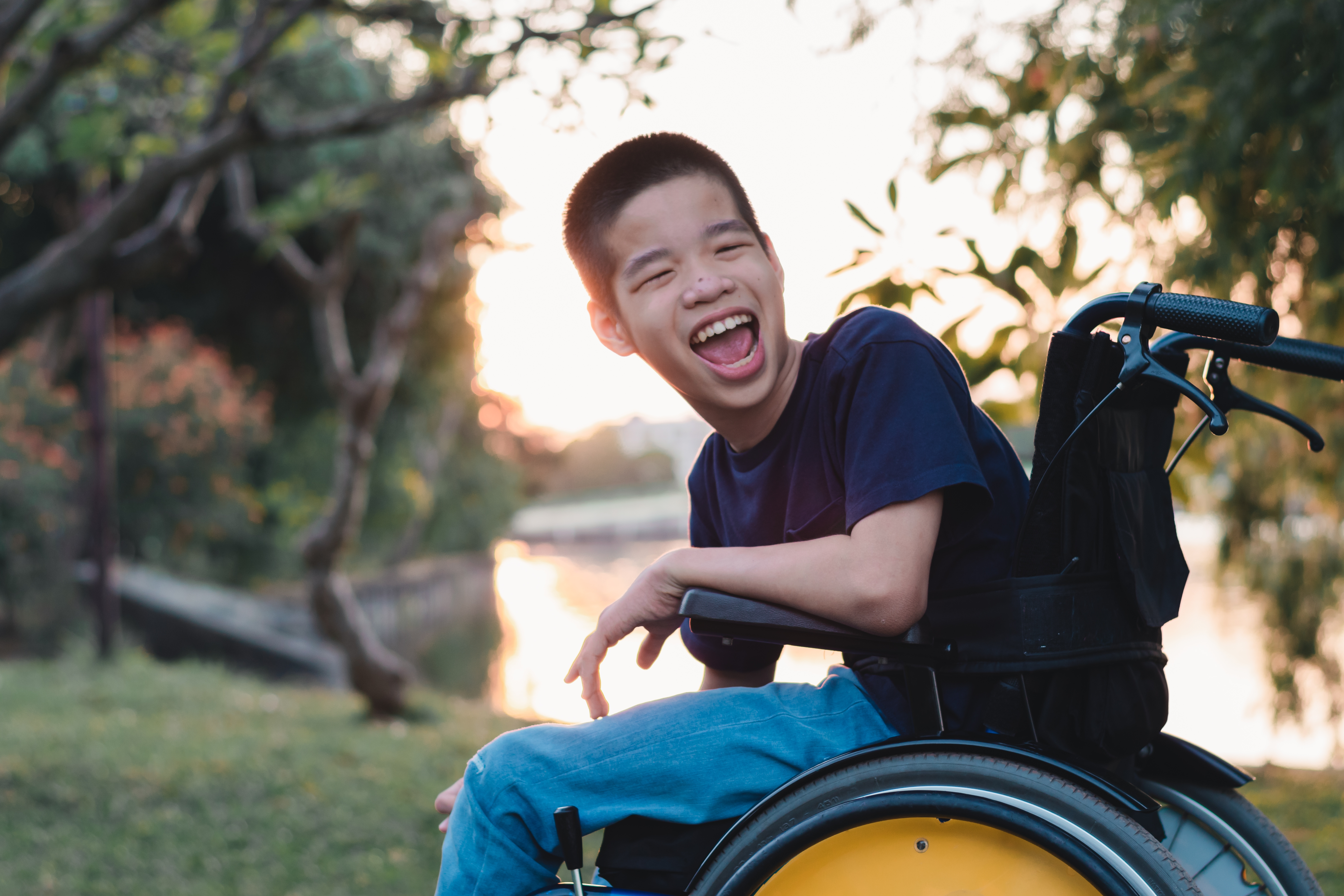 Young person in wheelchair enjoying outdoor activities in Cleveland Ohio